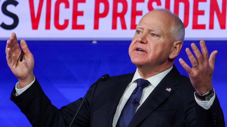 PHOTO: Democratic vice presidential nominee Minnesota Governor Tim Walz gestures as he speaks during a debate with Republican vice presidential nominee Sen. JD Vance in New York City, Oct. 1, 2024.  (Mike Segar/Reuters)