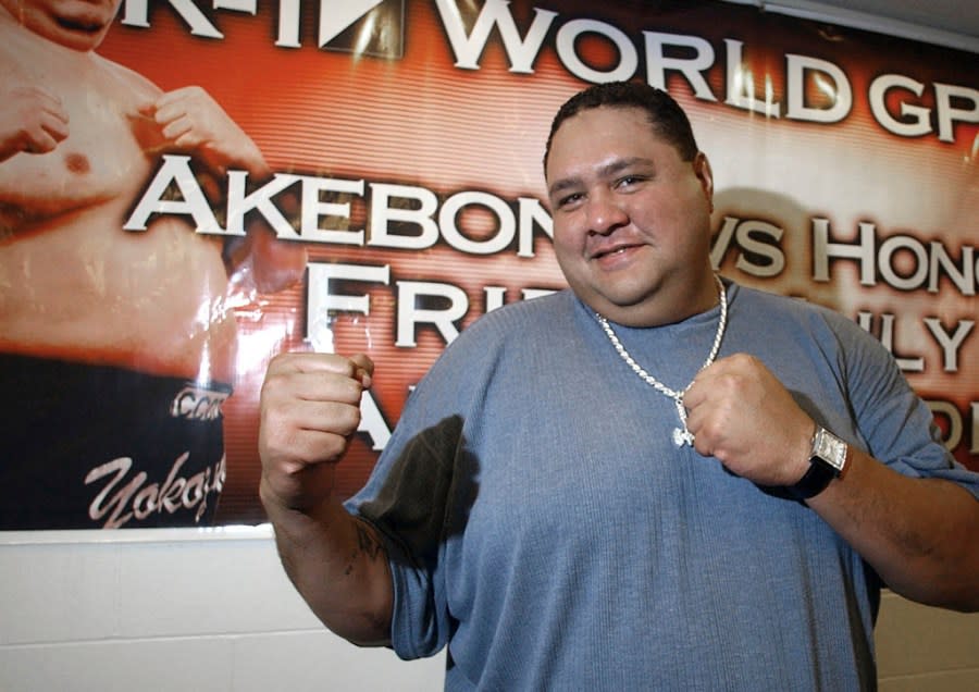 FILE – Akebono poses for a photo during a news conference at Aloha Stadium in Honolulu, Tuesday, July 26, 2005. Hawaii-born Akebono, one of the greats of sumo wresting and a former grand champion, is reported to have died earlier this month of heart failure while receiving care at a hospital in Tokyo, the United States Forces in Japan said in a statement on Thursday, April 11, 2024. (AP Photo /Lucy Pemoni, File)
