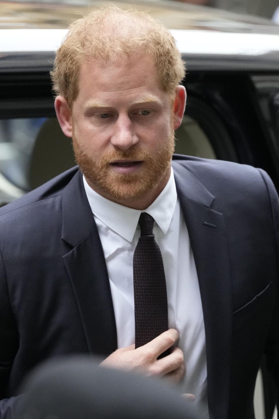 Prince Harry arrives at the High Court in London, Tuesday, June 6, 2023. Prince Harry is due at a London court to testify against a tabloid publisher he accuses of phone hacking and other unlawful snooping. Harry alleges that journalists at the Daily Mirror and its sister papers used unlawful techniques on an "industrial scale" to get scoops. Publisher Mirror Group Newspapers is contesting the claims. (AP Photo/Frank Augstein)