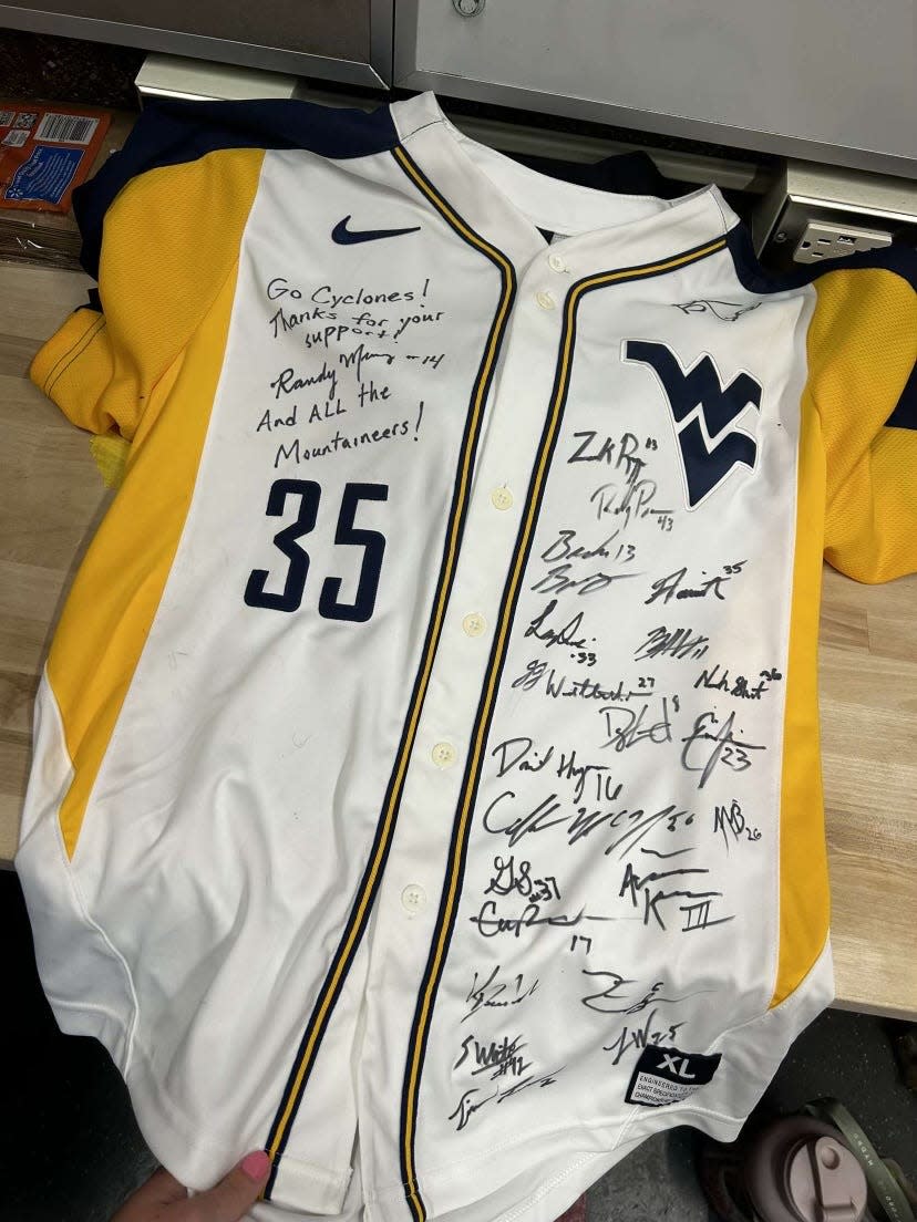 The signed West Virginia baseball jersey sent to the Iowa State softball team.