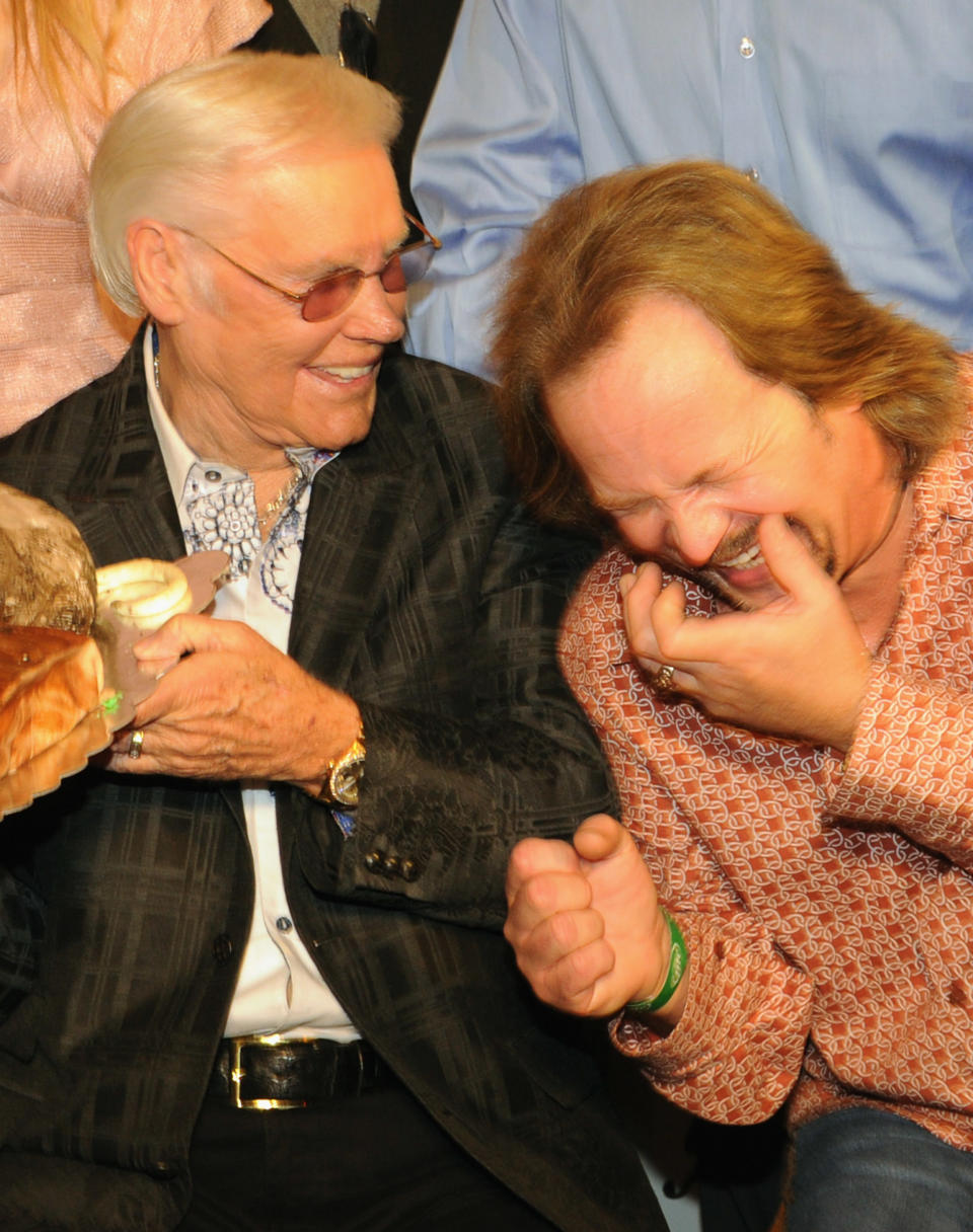 NASHVILLE, TN - SEPTEMBER 13: Country Music Legend George Jones and Singer/Songwriter Travis Tritt celebrate at his George Jones' 80th birthday party at Rippy's Bar & Grill on September 13, 2011 in Nashville, Tennessee. (Photo by Rick Diamond/Getty Images)