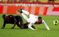 Soccer Football - Ligue 1 - AS Monaco v OGC Nice - Stade Louis II, Monaco - January 16, 2019 AS Monaco's Youri Tielemans in action with Nice's Malang Sarr REUTERS/Eric Gaillard