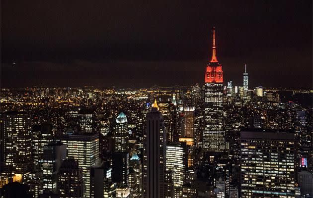 The Empire State building is lit with red lights in honor of World Aids Day. Source: Getty