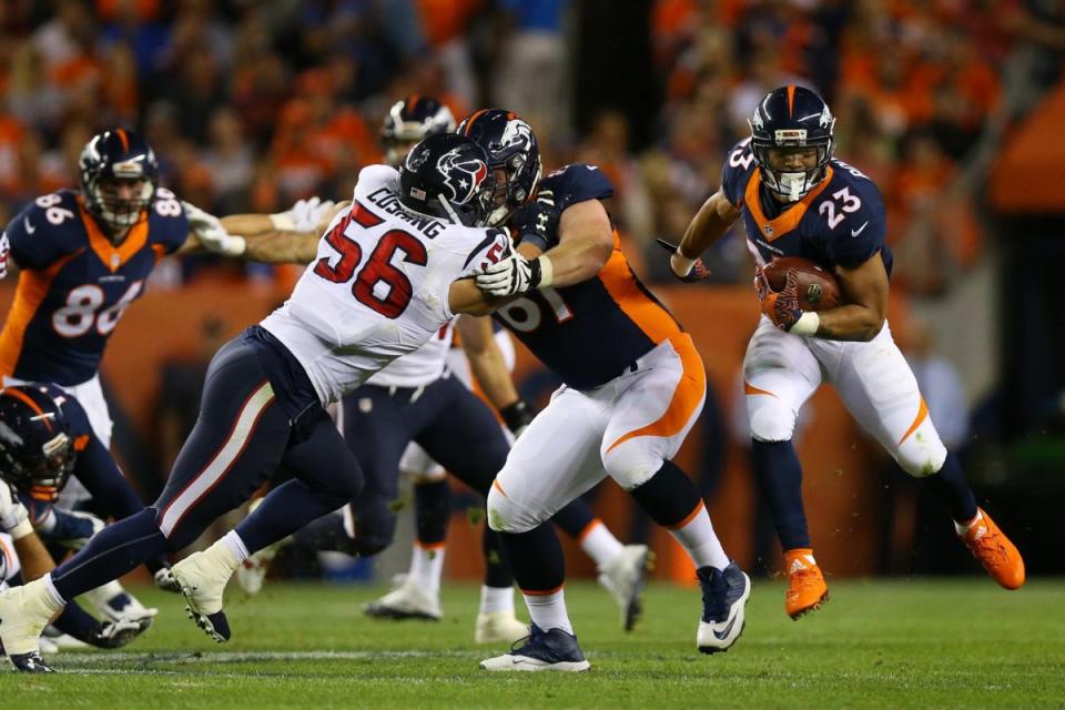 Running back Devontae Booker of the Denver Broncos runs against the Houston Texans. (Photo by Justin Edmonds/Getty Images)