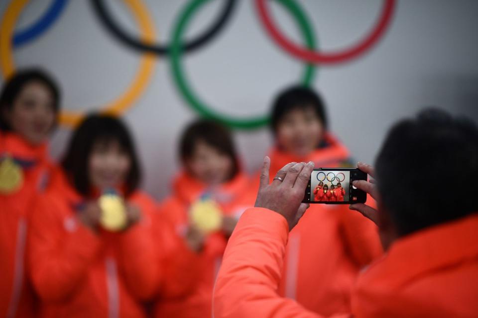 <p>While athletes can use and post to <a href="https://stillmed.olympic.org/media/Document%20Library/OlympicOrg/Games/Winter-Games/Games-PyeongChang-2018-Winter-Olympic-Games/IOC-Social-and-Digital-Media-Guidelines/PyeongChang-2018-Social-Media-Guidelines-eng.pdf" rel="nofollow noopener" target="_blank" data-ylk="slk:social media;elm:context_link;itc:0;sec:content-canvas" class="link ">social media</a> during the games, there are restrictions. Images and video showing the field of play or backstage areas like athlete and coach only ares are off limits.</p>