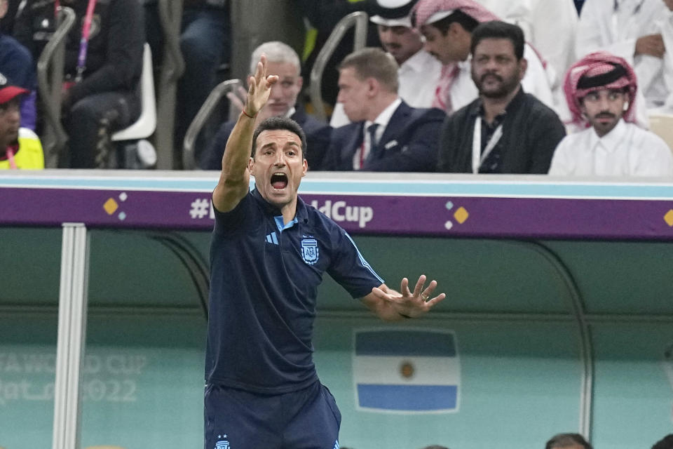 Argentina's head coach Lionel Scaloni gives instructions during the World Cup group C soccer match between Argentina and Mexico, at the Lusail Stadium in Lusail, Qatar, Saturday, Nov. 26, 2022. (AP Photo/Ariel Schalit)