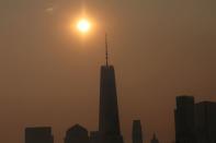 Haze and smoke shrouds Manhattan skyline from Canadian wildfires in New York