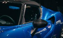 <p>Everything else is typical 4C, meaning lots of plastic and carbon-fiber trim, a head unit that looks straight out of the 1990s, and not much else.</p>