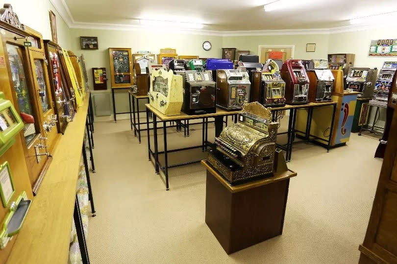 Ken and Stewart's "astonishing" collection of 82 machines forms its own arcade and includes one-armed bandits dating back from the 1890s to the 1970s and a relic from Blackpool Pleasure Beach -Credit:Hansons