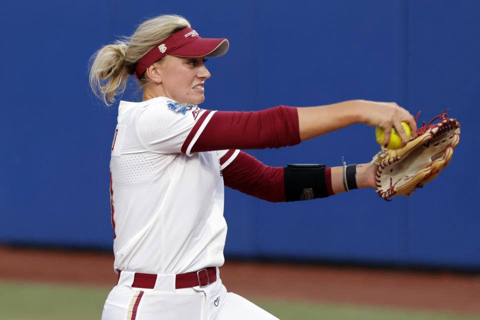 Florida State's Mack Leonard pitches against Oklahoma during the first inning of the first game of the NCAA Women's College World Series softball championship series Wednesday, June 7, 2023, in Oklahoma City. (AP Photo/Nate Billings)