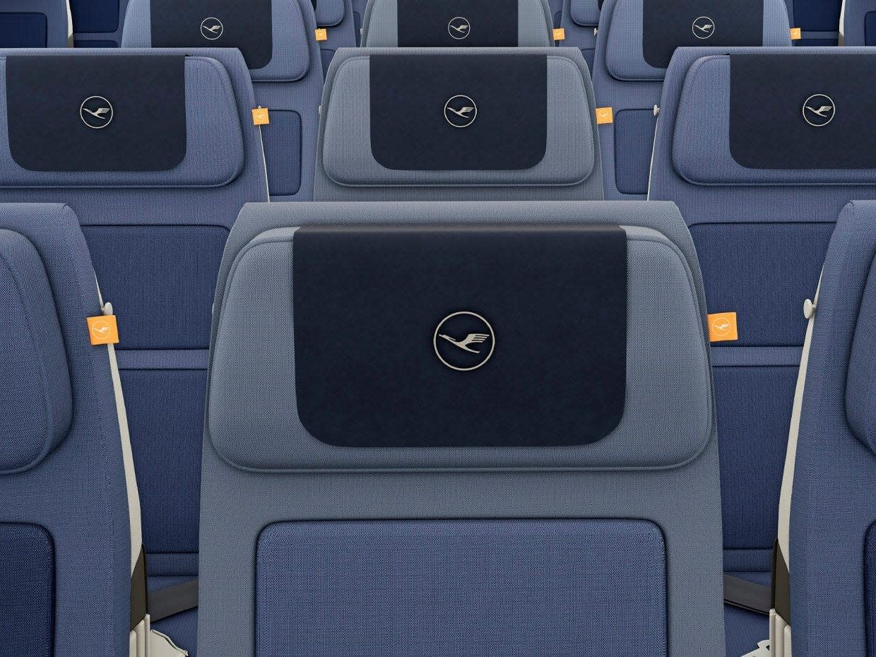 Lufthansa economy headrest with logo.