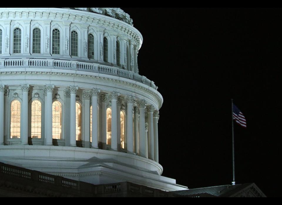 With no Republican support, Congress passes the measure, designed to extend health care coverage to more than 30 million uninsured people. Republican opponents scorned the law as "Obamacare." (Mark Wilson/Getty Images)  