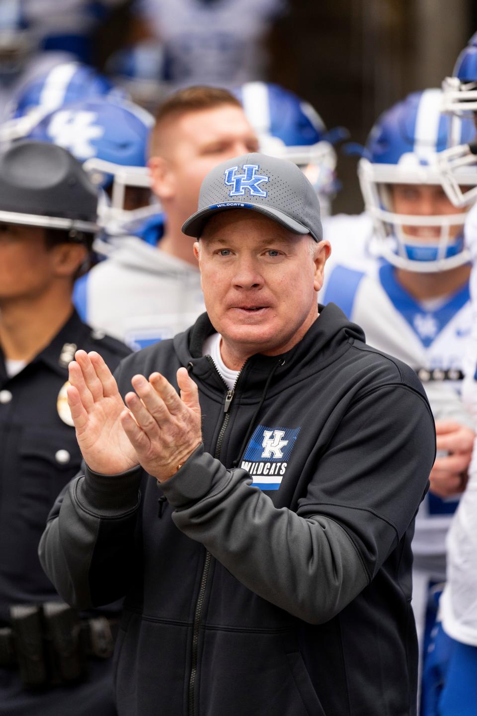 Kentucky head coach Mark Stoops leads his team to the field before the start of an NCAA college football game against Missouri, Saturday, Nov. 5, 2022, in Columbia, Mo. Kentucky won 21-17. (AP Photo/L.G. Patterson)