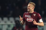 Torino's defender Kamil Glik celebrates after scoring during the Italian Serie A football match Torino vs Napoli on March 1, 2015 at the Olympic Stadium in Turin