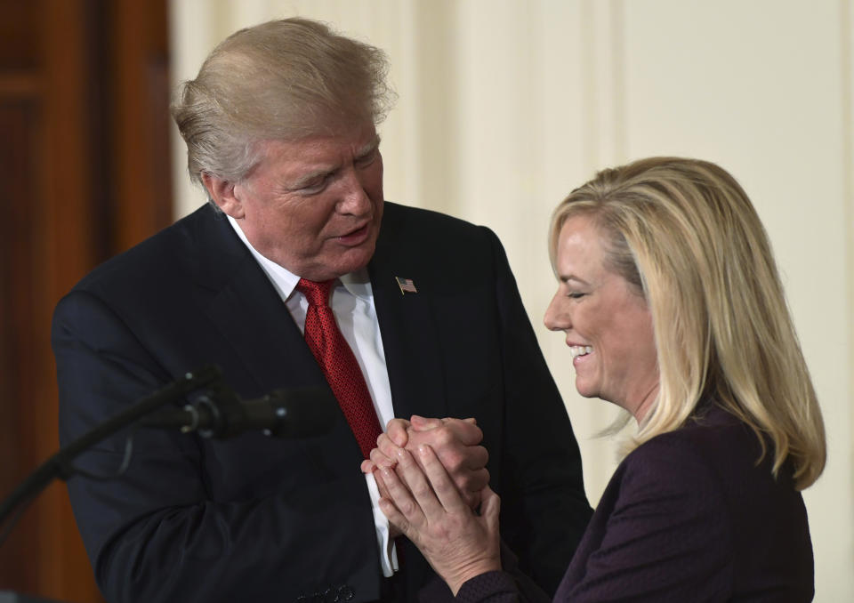 FILE - In this Oct. 12, 2017 file photo, President Donald Trump, left, shakes hands with Kirstjen Nielsen, right, after Trump announced that she is his choice to be the next Homeland Security Secretary, in the East Room of the White House in Washington. President Donald Trump has soured on Homeland Security Secretary Kirstjen Nielsen and she is expected to leave her job as soon as this week. That’s according to two people who spoke to the Associated Press on condition of anonymity. (AP Photo/Susan Walsh)