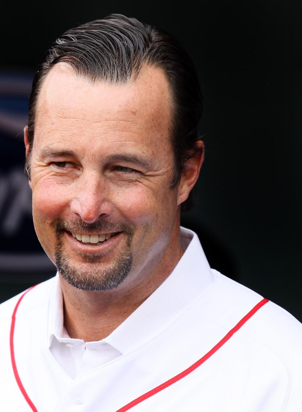 BOSTON, MA - MAY 15:  Former Red Sox pitcher Tim Wakefield stands in the dugout before the game against the Seattle Mariners on May 15, 2012 at Fenway Park in Boston, Massachusetts. Wakefield was honored in a pregame ceremony by the Boston Red Sox.  (Photo by Elsa/Getty Images)