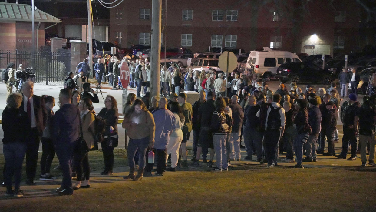 Residents line up outside for a town hall meeting at East Palestine High School in East Palestine, Ohio. (AP Photo/Gene J. Puskar)