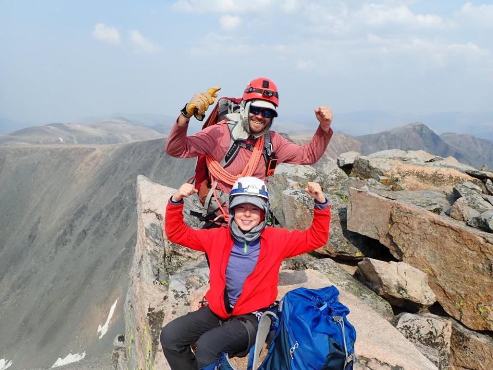 Mills and Scott Weinstein celebrate reaching the summit of Granite Peak — the highest point in Montana. The father and son from Clay County are attempting to reach the highest point in all 50 states. All that remains for them is Alaska's Denali, the highest point in North America.