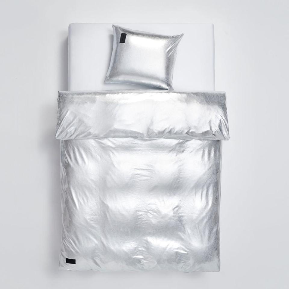 <p><a href="https://go.redirectingat.com?id=74968X1596630&url=https%3A%2F%2Fwww.farfetch.com%2Fshopping%2Fmen%2Fmagniberg-nude-metallic-duvet-cover-item-22466119.aspx&sref=https%3A%2F%2Fwww.elle.com%2Ffashion%2Fshopping%2Fg46676320%2Fbest-luxury-duvet-covers%2F" rel="nofollow noopener" target="_blank" data-ylk="slk:Shop Now;elm:context_link;itc:0;sec:content-canvas" class="link ">Shop Now</a></p><p>Metallic Duvet Cover</p><p>farfetch.com</p><p>$1021.00</p>