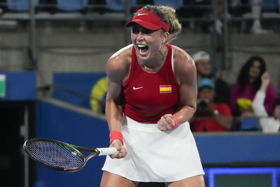 Spain's Paula Badosa celebrates after defeating Britain's Harriet Dart in their Group D match at the United Cup tennis event in Sydney, Australia, Sunday, Jan. 1, 2023. (AP Photo/Mark Baker)