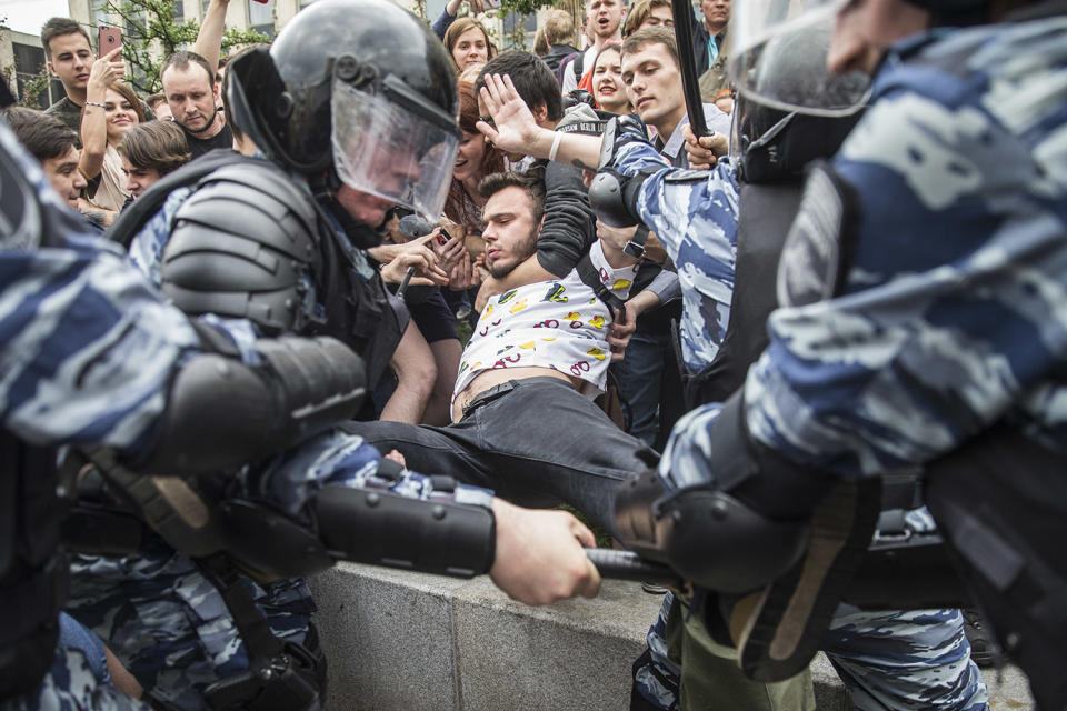 <p>Police detain a protester In Moscow, Russia, Monday, June 12, 2017. (Evgeny Feldman/AP) </p>