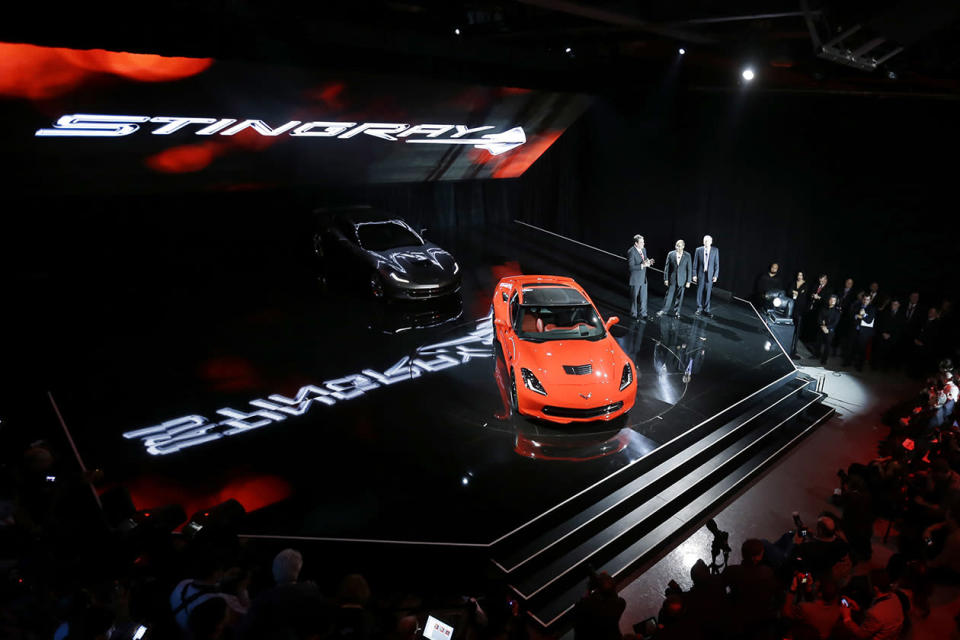 General Motors unveils its newly redesigned Corvette Stingray in a formal industrial complex.