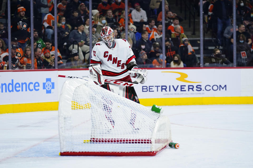 Carolina Hurricanes' Antti Raanta reacts after a scuffle between the Hurricane's and Philadelphia Flyers overturned his net during the second period of an NHL hockey game, Friday, Nov. 26, 2021, in Philadelphia. (AP Photo/Matt Slocum)
