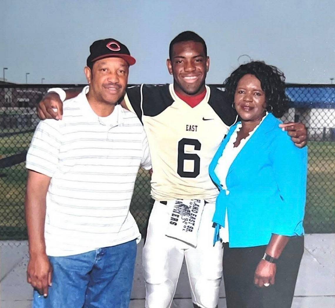 Photo of Christian “Tobi” Obumseli and his parents provided by the Obumseli family.
