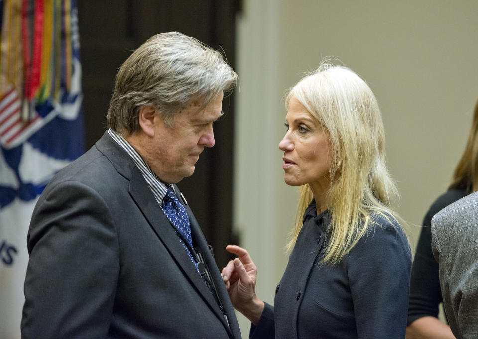 Assistant to the President and Chief Strategist Steve Bannon, left and Counselor to the President Kellyanne Conway, right, have a conversation prior to the arrival of US President Donald Trump who will hold a listening session with cyber security experts in the in the Roosevelt Room of the White House in Washington, DC on Tuesday, January 31, 2017. Credit: Ron Sachs / Pool via CNP *** Please Use Credit from Credit Field ***