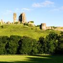 <p>Corfe Castle is both the name of an ancient castle in Dorset, and also the village that it perches 55 metres above. Both are picturesque and well worth a visit. Thought to date back 1,000 years, the castle has seen lots of battle damage throughout its history, leaving it a fascinating open-air ruin to explore. Not only can visitors enjoy the breathtaking views from around the castle, but also the pretty green grounds at its base.</p><p><a href="https://www.instagram.com/p/CAw3GNgoDhv/?utm_source=ig_embed&utm_campaign=loading" rel="nofollow noopener" target="_blank" data-ylk="slk:See the original post on Instagram;elm:context_link;itc:0;sec:content-canvas" class="link ">See the original post on Instagram</a></p>