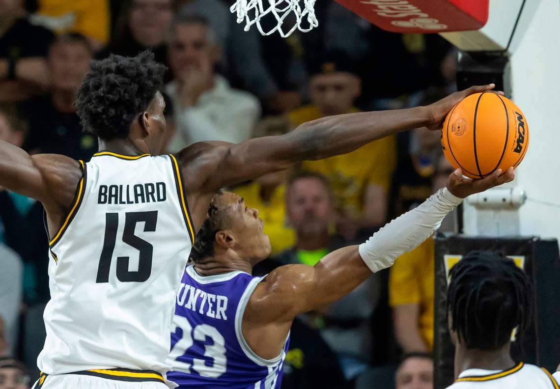 Wichita State’s Quincy Ballard blocks the shot of Central Arkansas’ Camren Hunter during the first half of their season-opening game on Monday night.