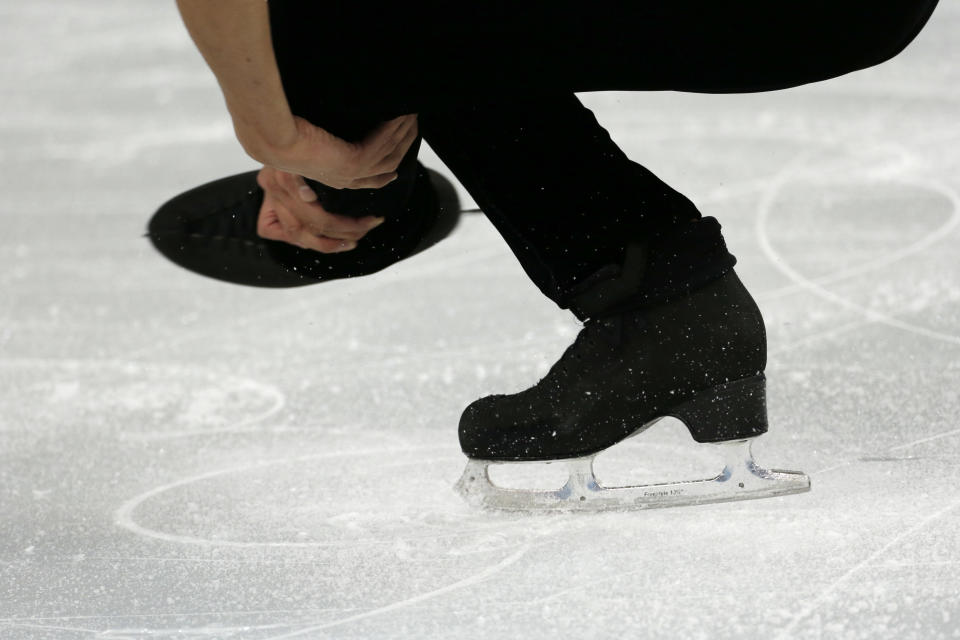 Michael Christian Martinez of the Philippines practices during a training session at the Iceberg Skating Palace ahead of the 2014 Winter Olympics, Wednesday, Feb. 5, 2014, in Sochi, Russia. (AP Photo/Bernat Armangue)