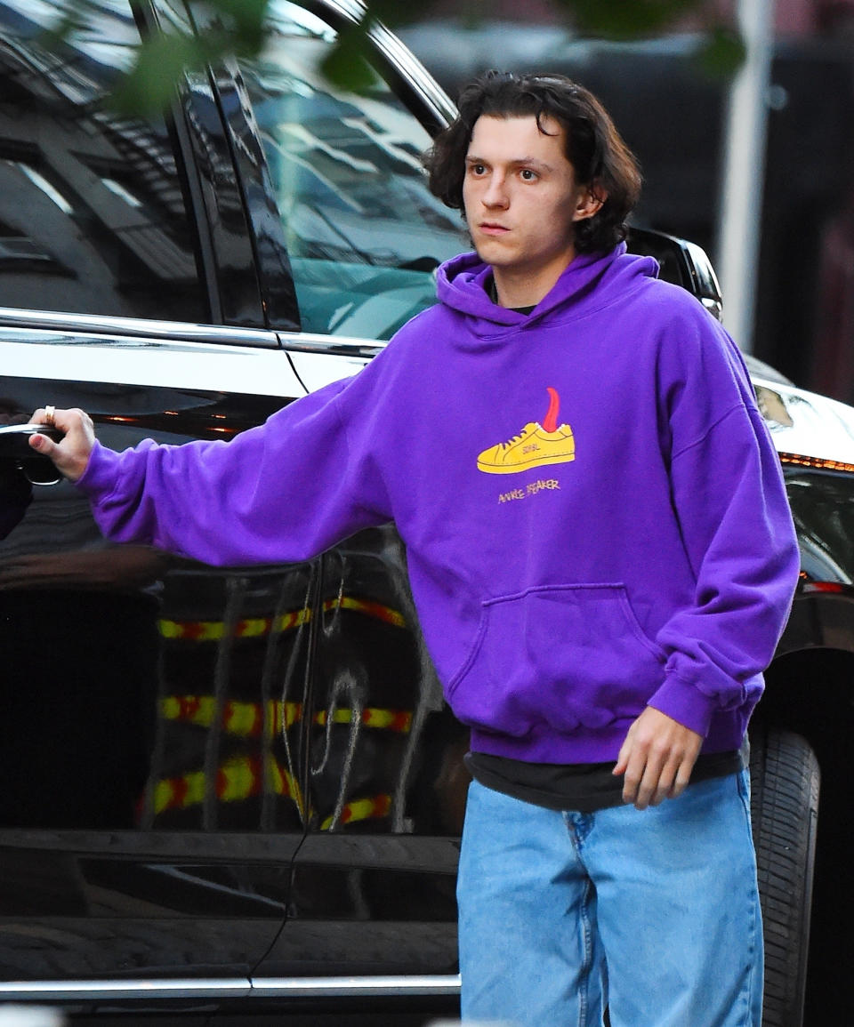 <p>Tom Holland keeps it casual for a lunch outing in N.Y.C. on Aug. 17.</p>