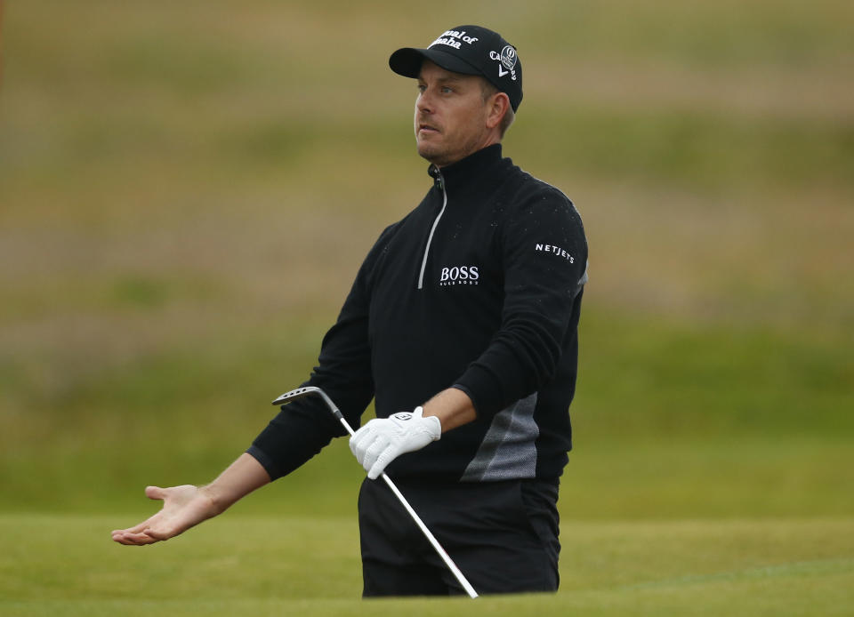 Golf - British Open - Sweden's Henrik Stenson reacts after playing out of a bunker on the 16th hole during the second round - Royal Troon, Scotland, Britain - 15/07/2016. REUTERS/Paul Childs