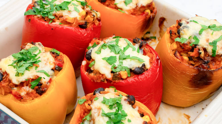 enchilada-stuffed peppers in baking dish
