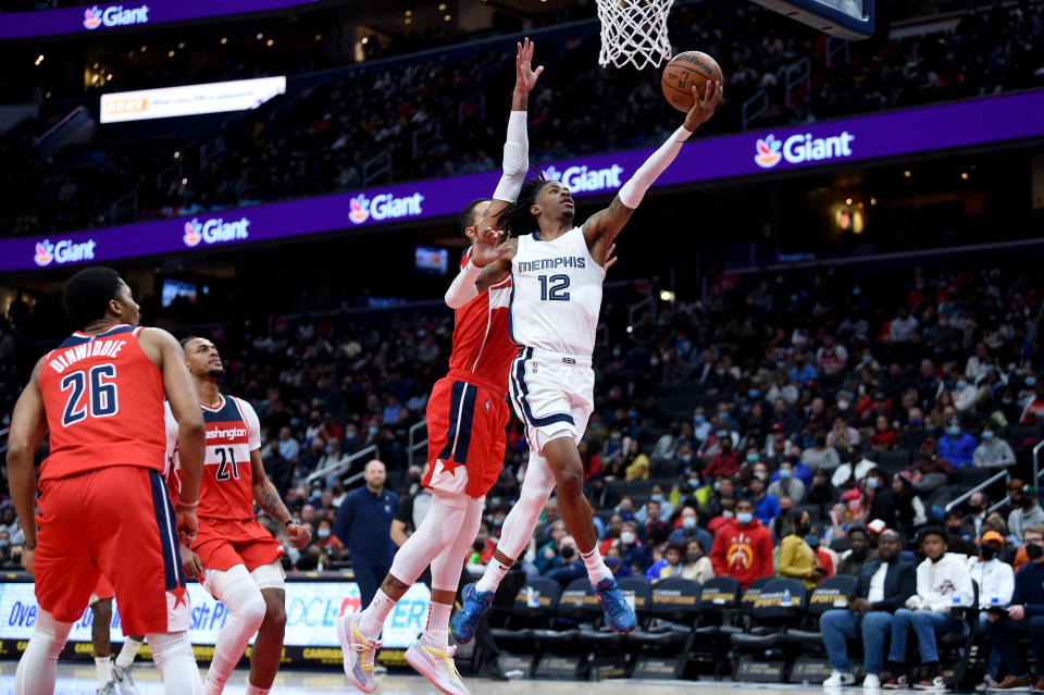 Ja Morant drives to the hoop for a layup.