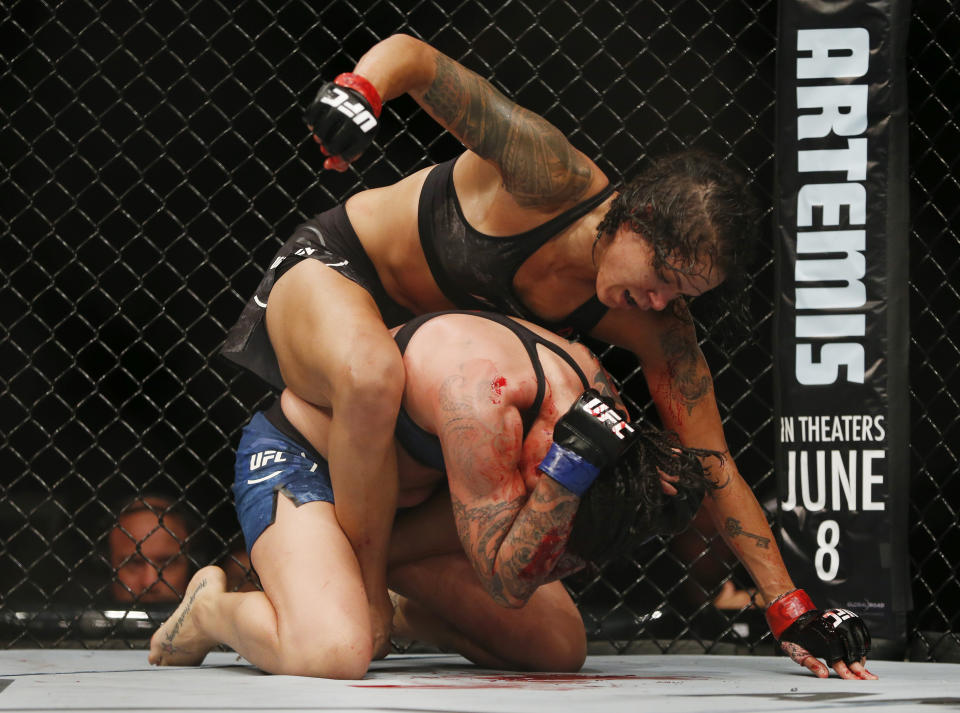 Raquel Pennington fully supported her corner’s decision to compel her to keep fighting at UFC 224 despite the bloody beating she suffered. (AP)