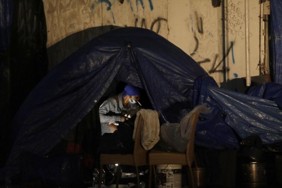 A homeless woman on skid row.