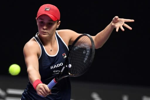 Ashleigh Barty came back from a torrid first set marred by 20 unforced errors to beat Belinda Bencic 5-7, 6-1, 6-2