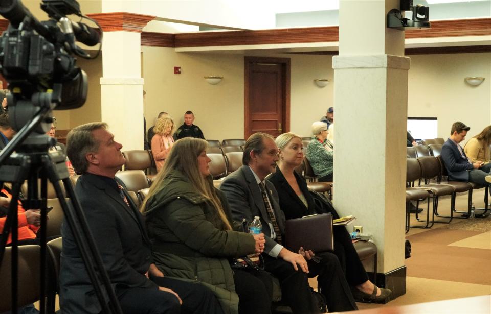 Sen. Julie Frye-Mueller, R-Rapid City, sits with her husband and lawyers ahead of the Senate Select Committee on Discipline and Expulsion in Pierre on Tuesday, Jan. 31.