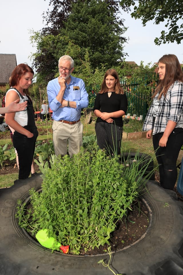 Jeremy Corbyn meets members of the community garden project  