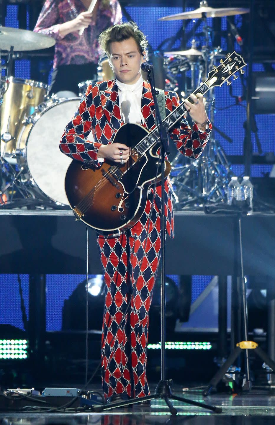 2) Harry Styles Goes All Harlequin!