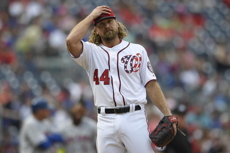 Washington Nationals relief pitcher Trevor Rosenthal (44) reacts during the eighth inning of a baseball game against the New York Mets, Saturday, March 30, 2019, in Washington. The Mets won 11-8. (AP Photo/Nick Wass)