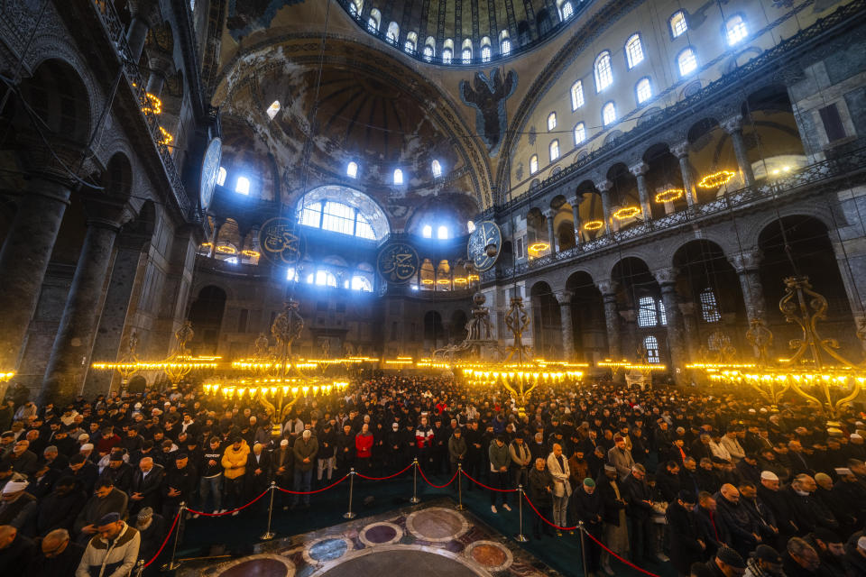 Muslim worshippers pray during the Muslim holy fasting month of Ramadan at Hagia Sophia mosque in Istanbul, Turkey, Friday, March 15, 2024. (AP Photo/Francisco Seco)