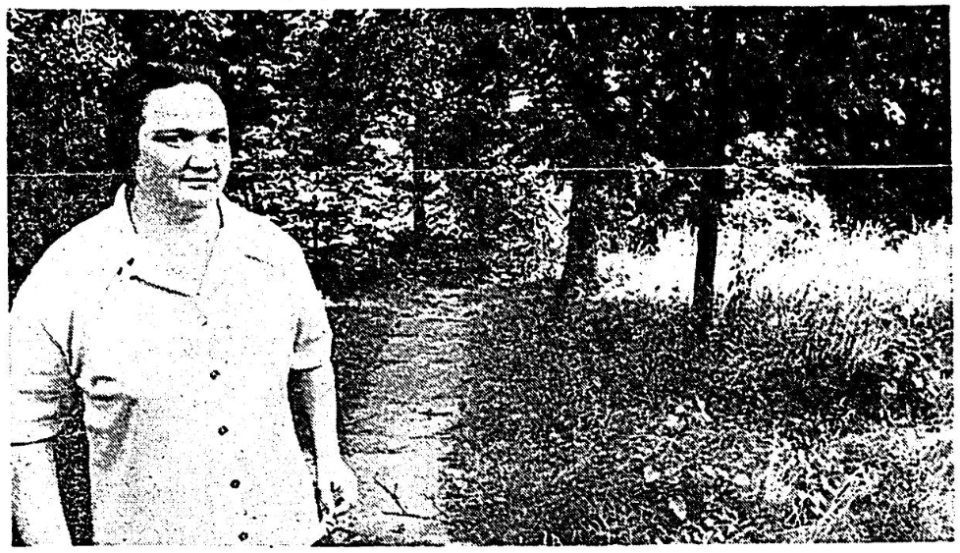 This photo from the July 22, 1974, Journal Star was captioned: "Mrs. Rudolph D'Elia at the site of what was once one of Peoria's better-known landmarks, the Alps Beer Garden. The garden itself, where patrons could sit at tables among trees and flowers, was at the right. The sidewalk leads to what once was the entrance to an underground tavern-cafe, where the midget circus performer, Gen. Tom Thumb, is said to have played pool."