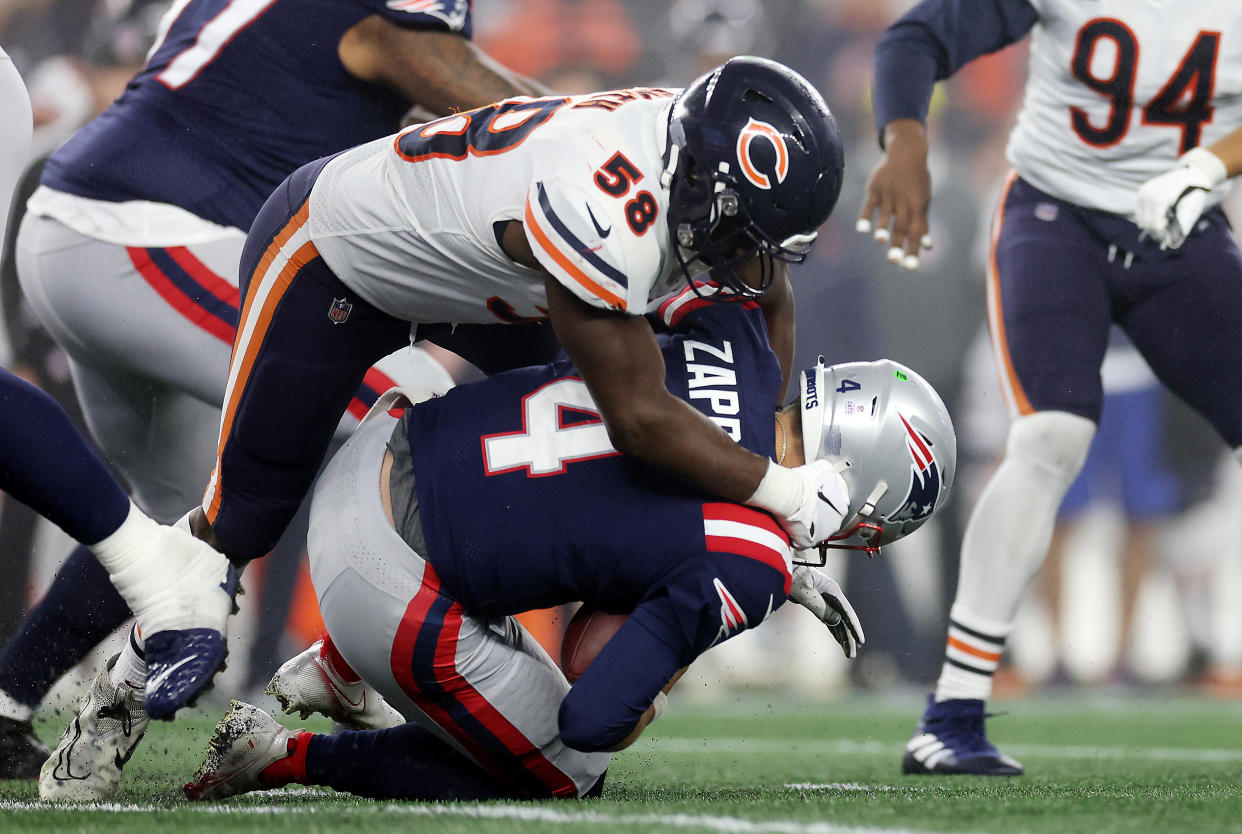 Roquan Smith of the Chicago Bears sacks Bailey Zappe of the New England Patriots during Monday night's game. (Photo by Maddie Meyer/Getty Images)
