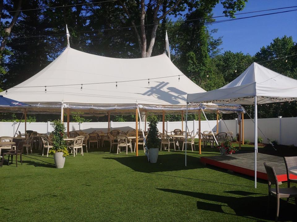 Al fresco dining area and outdoor bar at Lorenzo's Italian Restaurant.