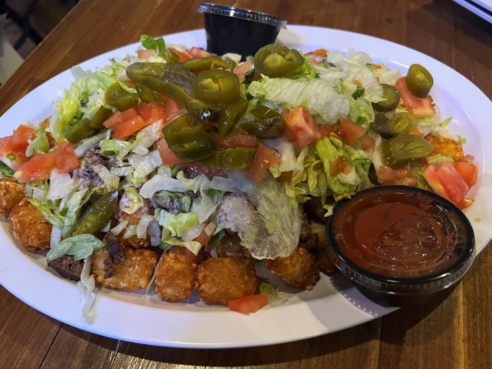 Totchos make the menu at Beer Can Alley.