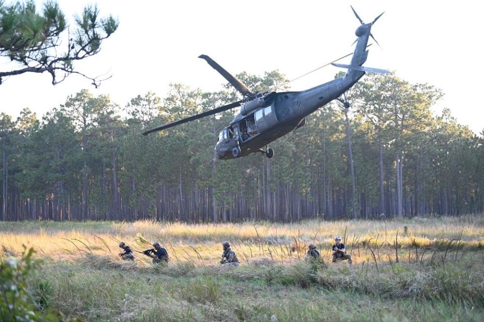 Special Forces candidates assigned to the U.S. Army John F. Kennedy Special Warfare Center and School assault enemy role players as they take part in the final phase of field training known as Robin Sage in central North Carolina, Sept. 28, 2021. The exercise for soldiers in the Special Forces qualification course will be held again from Jan. 22, 2022, to Feb. 4, 2022, across 25 North Carolina counties.