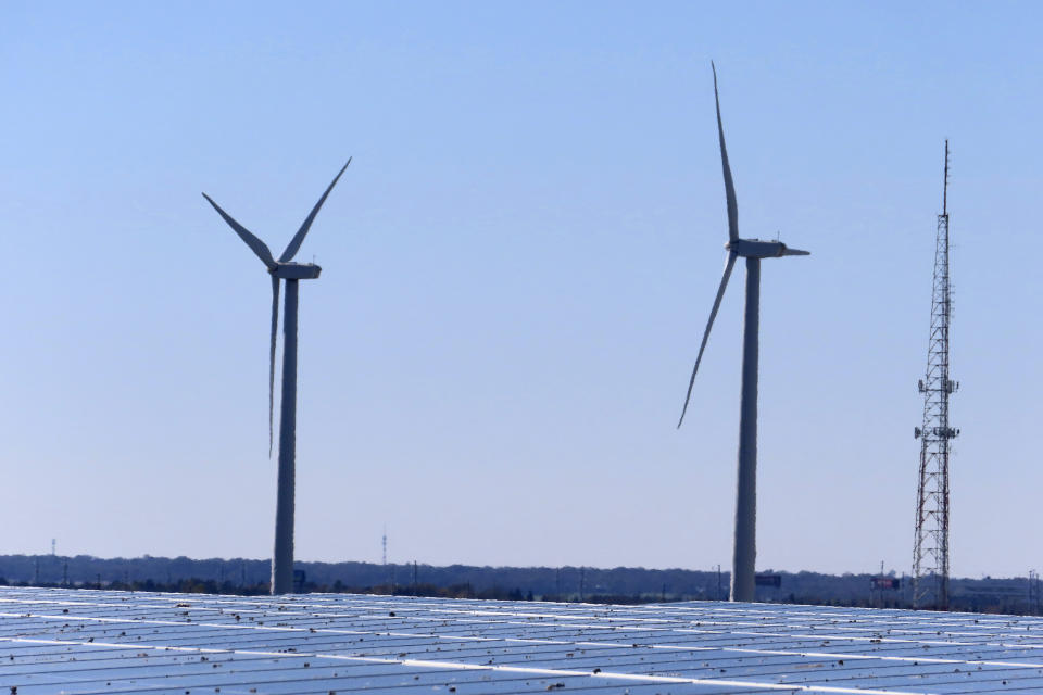 Land-based wind turbines spin in Atlantic City. N.J., on Nov. 3, 2023. On Tuesday, April 30, 2024, New Jersey utility regulators opened a fourth round of solicitations for new offshore wind farm proposals to join the three that already have preliminary approval. (AP Photo/Wayne Parry)